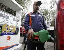 A worker at a petrol pump