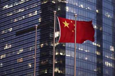 China lowers its GDP target for first time in 7 years