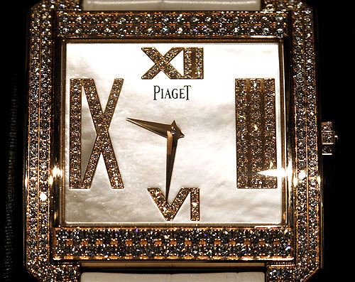 A watch is displayed in a glass cabinet at a newly opened shop of Swiss luxury brand Piaget at the Bahnhofstrasse in Zurich.