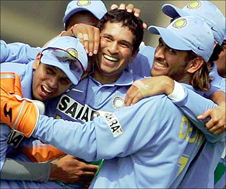 Sachin Tendulkar celebrates with team mates.