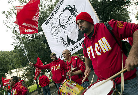Workers from Italy's radical metalworkers union Fiom protest during a one-day strike in Rome.