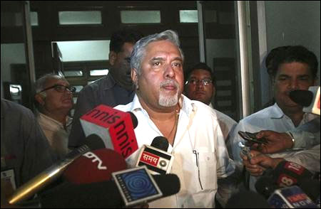 Kingfisher Airlines Chairman Vijay Mallya speaks with the media after his meeting with Director General of Civil Aviation E K Bharat Bhushan.