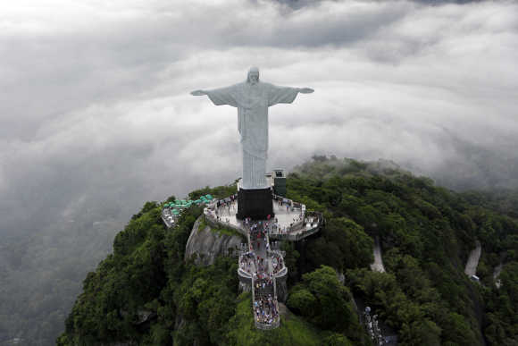 An aerial view of the famous Christ the Redeemer atop of Corcovado mountain in Rio de Janeiro.