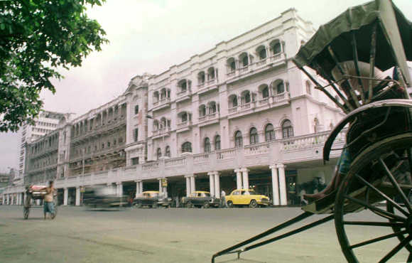 A rickshaw stands outside the Grand Hotel in Kolkata.