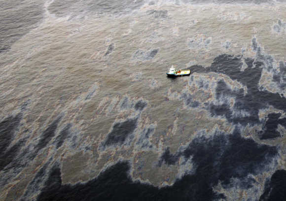 An aerial view shows oil that seeped from a well operated by Chevron at Frade, on the waters in Campos Basin in Rio de Janeiro, Brazil.