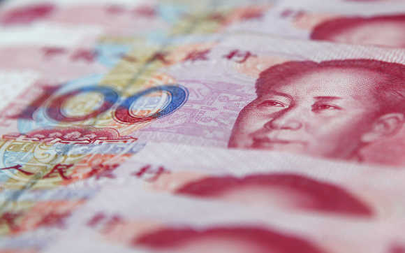 Chinese 100 yuan banknotes are seen in Shanghai.