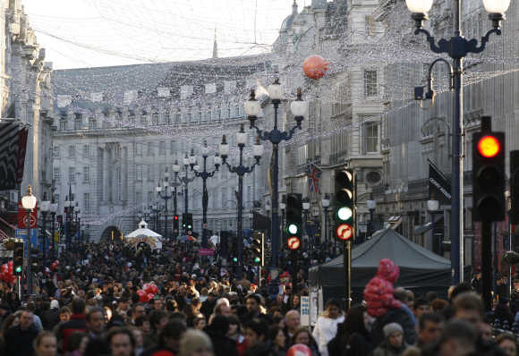 Shoppers fill Regent Street in central London.