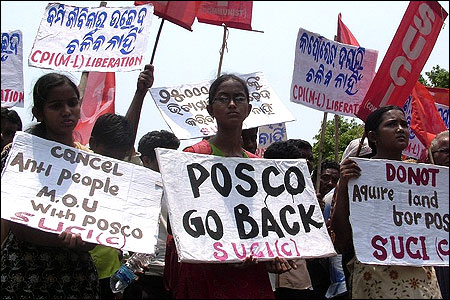 Villagers and their children at the proposed site of POSCO during a protest in Orissa on June 11, 2011.