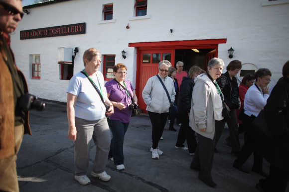 Tourists pay a visit to Edradour distillery.