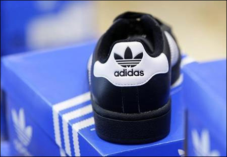 A shoe of the Adidas fashion line is pictured in a Munich shoe shop.