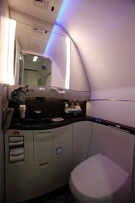 The washroom of a Boeing 787 Dreamliner is lit up with LED lighting.