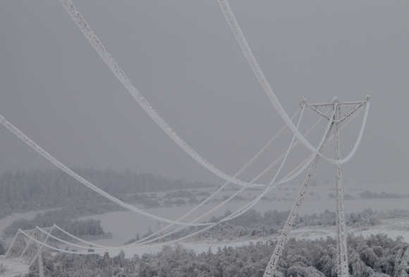 Electric wires are covered in ice near the village of Skala, about 20km north of Krakow, Poland.