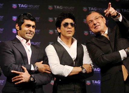 TAG Heuer brand ambassadors (from left) racing driver Karun Chandhok, actor Shah Rukh Khan along with Jean Christophe Babin, president and chief executive officer, TAG Heuer, at the launch of the new TAG Heuer Carrera Monaco Grand Prix Limited Edition Chronograph in Mumbai.