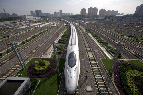 A CRH (China Railway High-speed) Harmony bullet train pulls into Beijing South Railway Station.