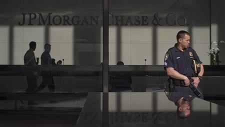 A policeman stands guard outside the JP Morgan headquarters in New York