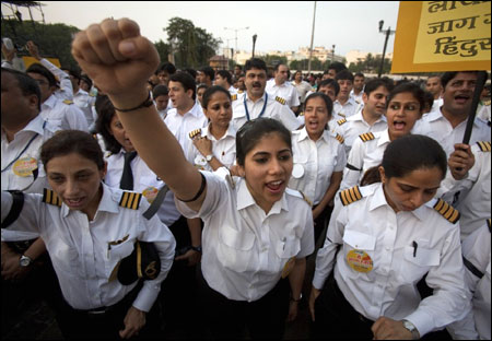 Air India pilots shout slogans.