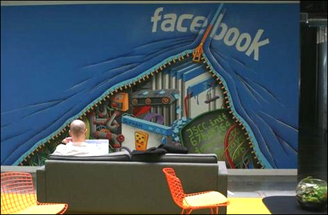 An employee works on a computer at the headquarters of Facebook in Menlo Park, California.