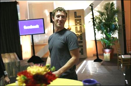Facebook CEO Mark Zuckerberg walks through Facebook headquarters.