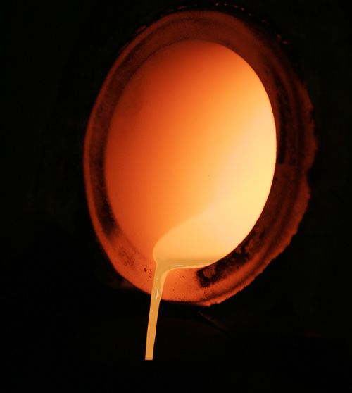 Highly pure molten gold for use in electronic devices is poured at a Tanaka Kikinzoku Kogyo factory in Kanagawa prefecture.