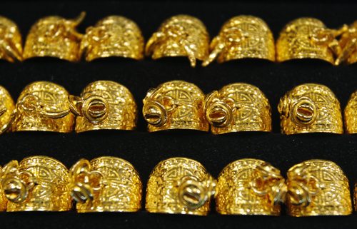 Gold rings displayed at a jewellery shop.