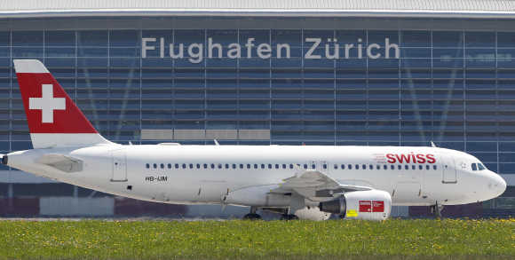 A jet of Swiss airlines rolls on Zurich airport's tarmac in Kloten.