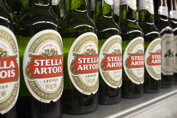 Bottles of Stella Artois beer are displayed for sale at a store in Hong Kong.