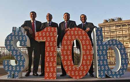 Tata Consultancy Services executives celebrate the magical $10-billion mark in its turnover.