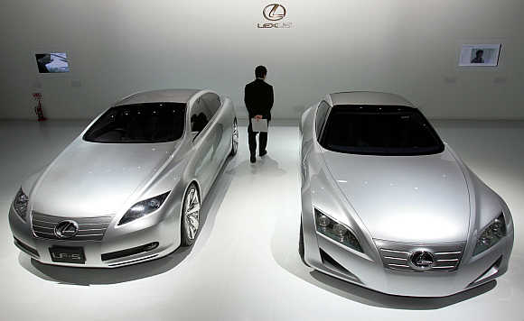 Toyota Motor Corp's Lexus brand concept vehicles LF-S, left, and LF-C, right, are displayed in Tokyo.