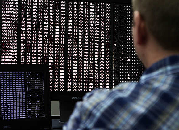 An analyst looks at code in the malware lab of a cyber security defence lab in Idaho Falls, Idaho, United States.