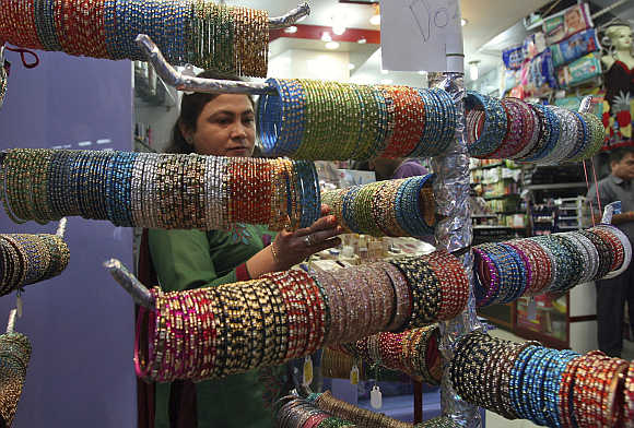 A woman buys bangles in Jammu.
