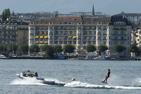 A wakeboarder performs on Lake Leman in Geneva.