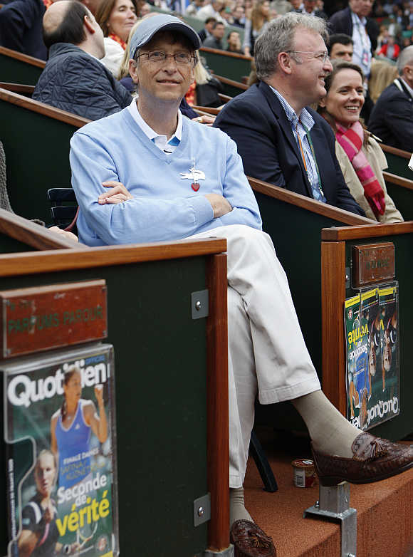 Bill Gates watches the women's final at Roland Garros in Paris.