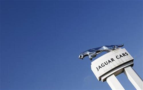 A Jaguar symbol is seen outside the Jaguar Land Rover's Halewood assembly plant in Liverpool