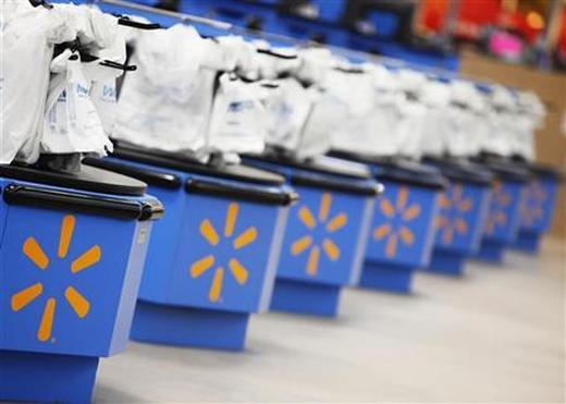 The Wal-Mart logo is pictured on cash registers at a new store