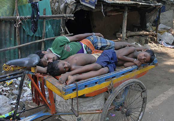 Villagers take a nap in Jagatsingpur district in Orissa.