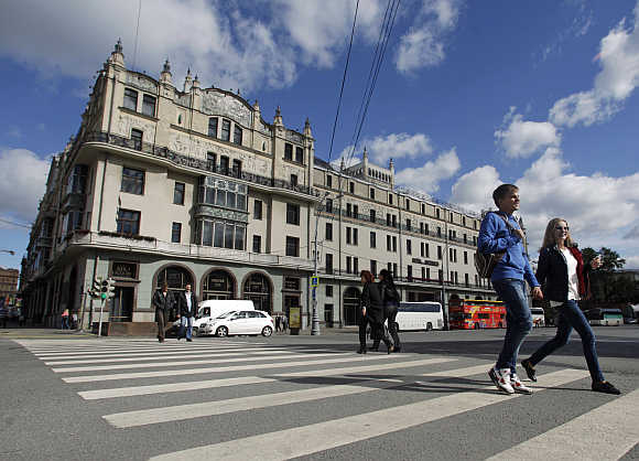 People cross the road near Metropol hotel in Moscow. Photo is for representation purpose only.
