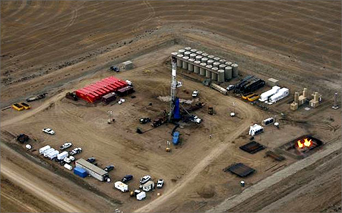 A oil drilling rig operates outside Williston, North Dakota.