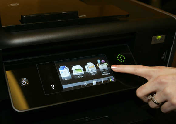 A touch screen menu is displayed on a Lexmark Platinum Pro905 printer in Las Vegas.