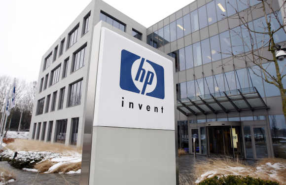 HP logo is seen outside Hewlett-Packard Belgian headquarters in Diegem.