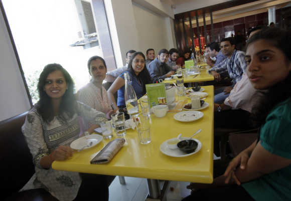 Guests eat at the Keys Hotel Nestor in Mumbai.