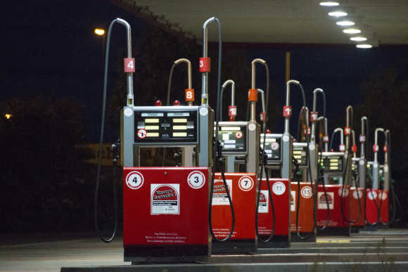 A row of gas pumps is seen at a petrol station in Berlin.