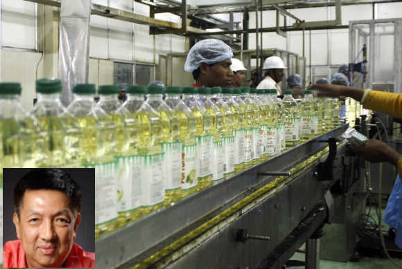 Peter Lim Eng Hock, inset, has a stake in palm oil giant Wilmar.