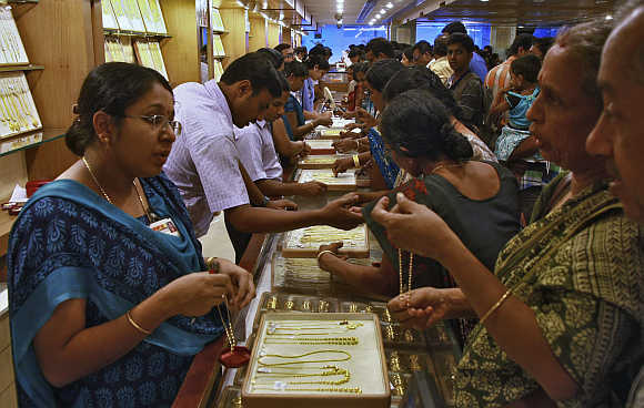 Customers at a gold jewellery showroom in Kochi.