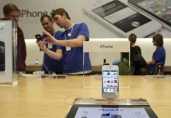 An iPhone 4S is shown at Apple's flagship retail store in San Francisco, California.