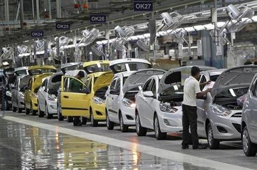 Workers assemble cars inside the Hyundai Motor India Ltd. plant at Kancheepuram district in Tamil Nadu.