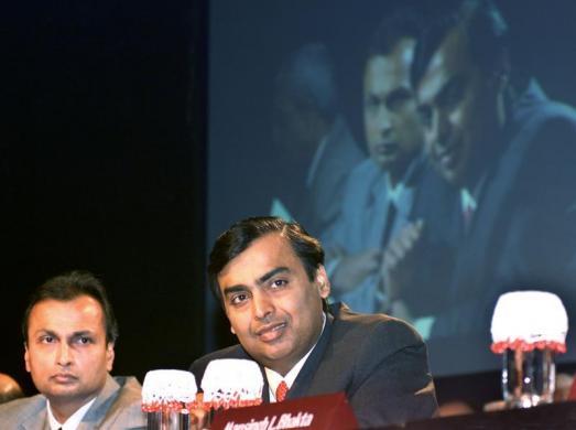 Mukesh Ambani and Anil Ambani are seen in Mumbai.