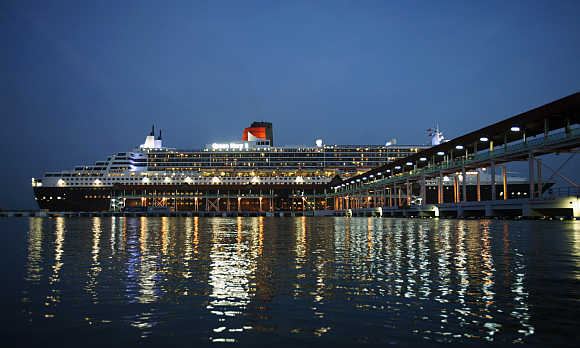World's largest ocean liner Queen Mary 2 docks at a jetty in Port Klang, outside Kuala Lumpur, Malaysia.