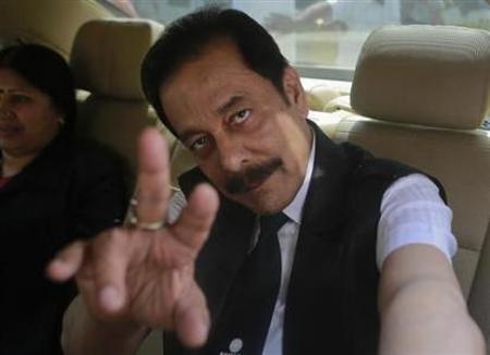 Sahara Group Chairman Subrata Roy gestures as he arrives at the Securities and Exchange Board of India headquarters in Mumbai.