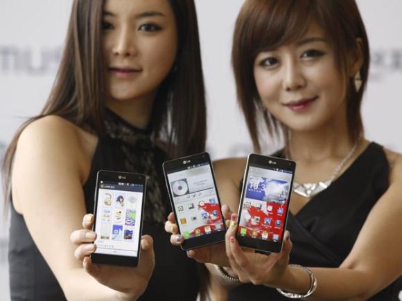 Models pose with LG Electronics' smartphones.