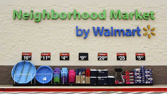 Products are displayed outside a Wal-Mart Neighborhood Market store in Bentonville, Arkansas.